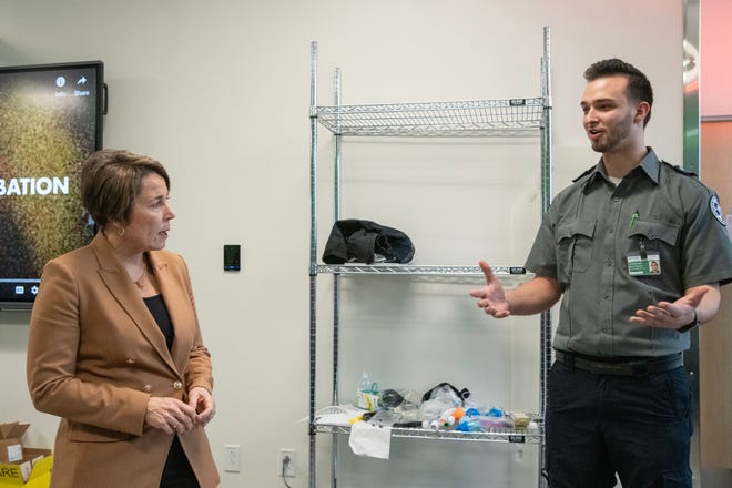 Gov. Maura Healey listens as paramedic student Ryan Murphy, of Southborough, explains his paramedic schooling during a tour of the newly-opened Center for Health Sciences, Early Childhood and Human Services at MassBay Community College on Franklin Street in Framingham, Jan. 30, 2024.