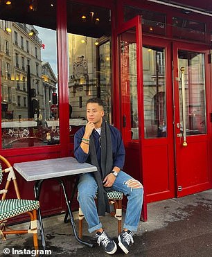 Another sits staring wistfully into the distance at a table outside