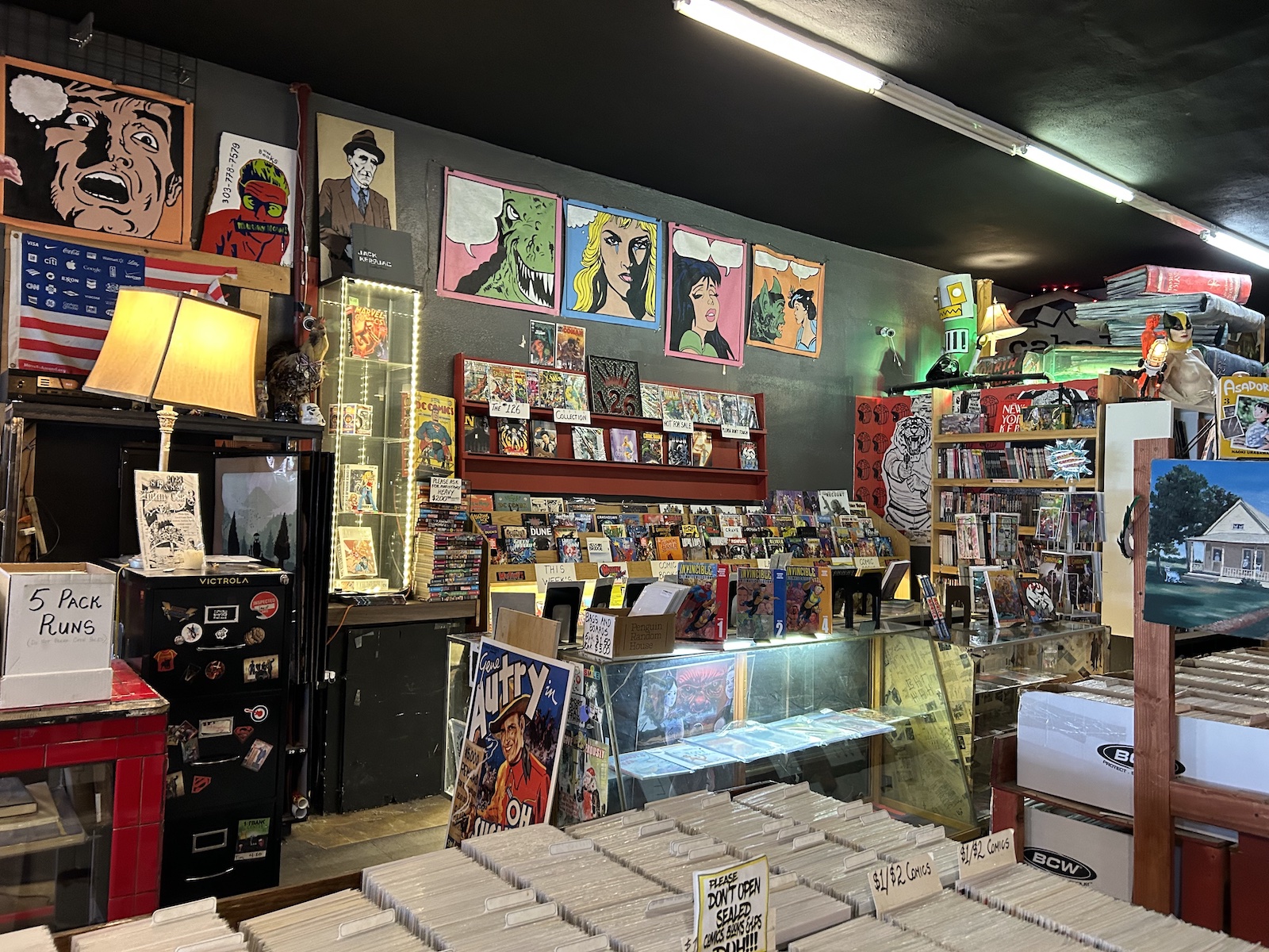 Posters and comics at Mutiny Information Cafe