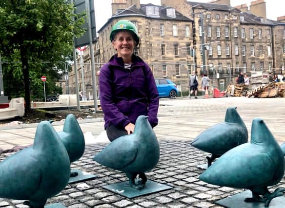 Artist Shona Kinloch with the beloved pigeon sculptures she created. Picture: Neil Johnstone