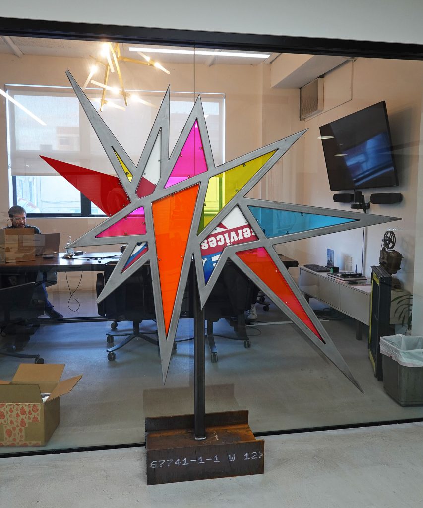 A sculpture by Tom Fruin celebrating Charney Companies' 10th anniversary. 
