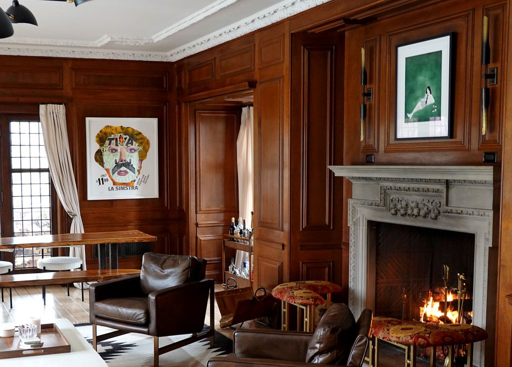 In the living room, <em>La Sinistra</em> by BÄST (left wall) and Honor Titus's <em>Chapel Thrill</em> (right wall).