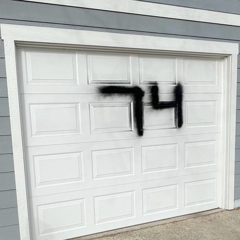 MenahgaGarageDoorGraffiti021024.N.PRE.jpg