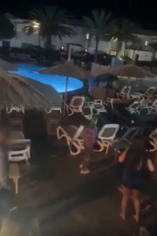 The mass brawl by the pool at the hotel