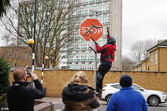 The revelation it was carried out by Banksy led to a stream of locals descending on the site and taking photos of the installation on their phones