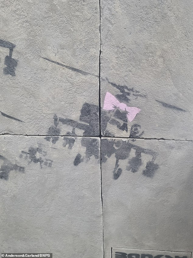 The famous street artist spray-painted Appache Attack helicopters with pink bows on them on the outside wall of an office building in Holywell Row, Shoreditch, east London, in 2006
