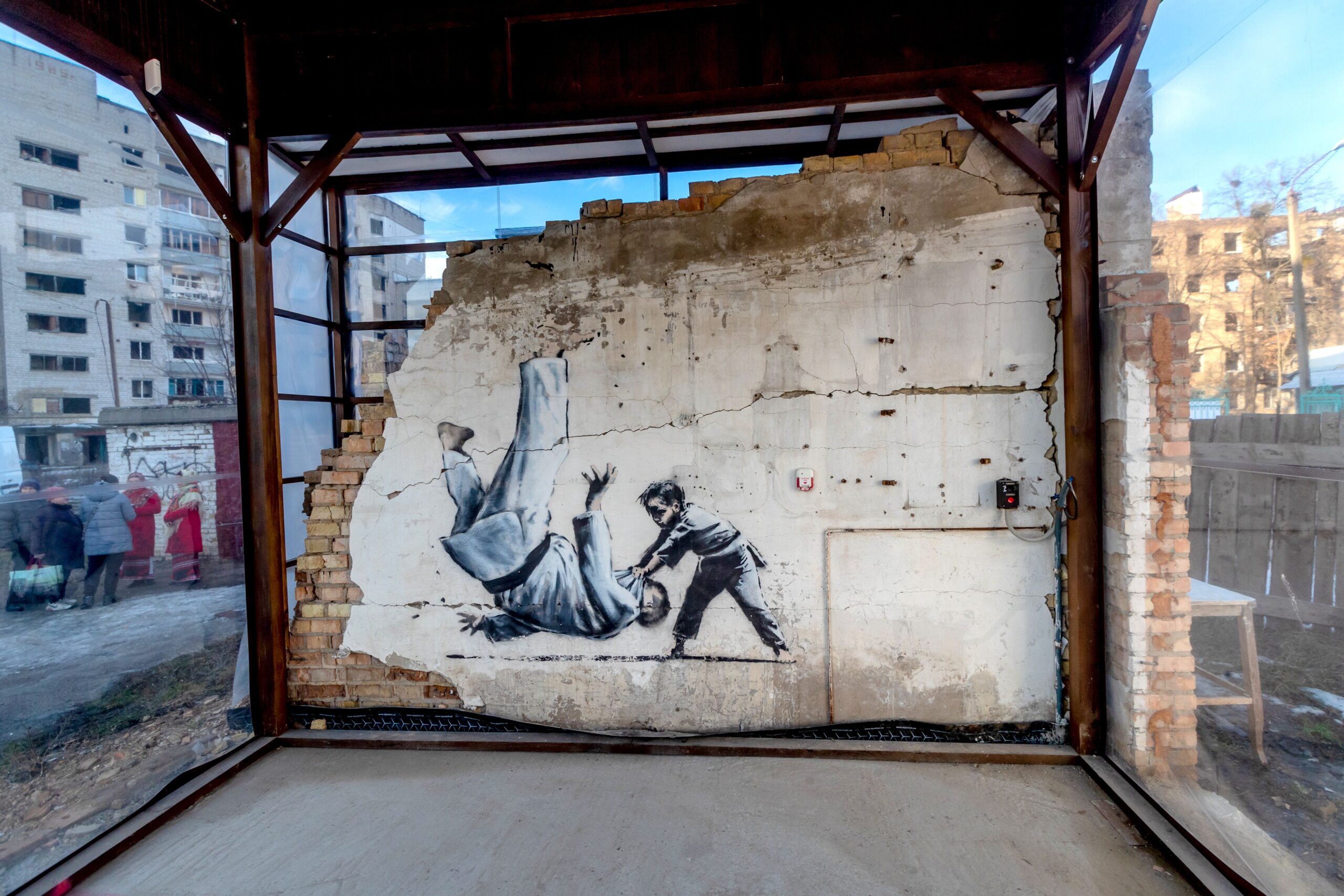 The Boy Who Defeats an Adult Judoka by Banksy pictured in Borodianka, Kyiv region, northern Ukraine