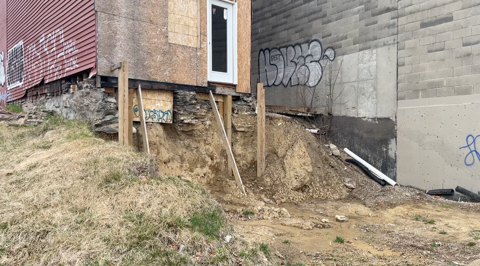 The vacant house next to the parking lot for Robin Imaging on Central Parkway. 