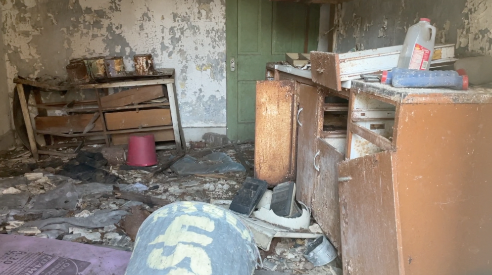 A vacant house built in 1900 in the 400 block of W. McMicken Avenue with a collapsing roof and caved in floor. 