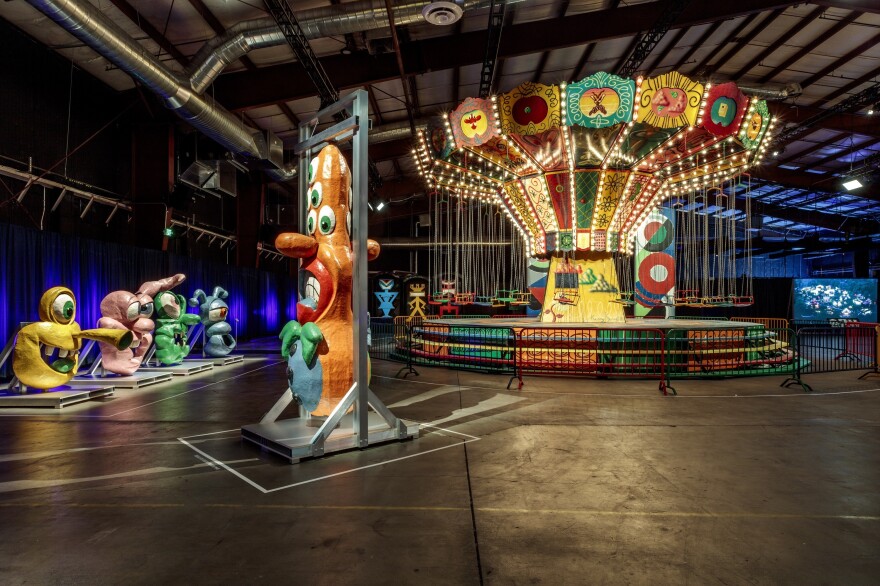 Kenny Scharf's painted swings at Luna Luna in Los Angeles.