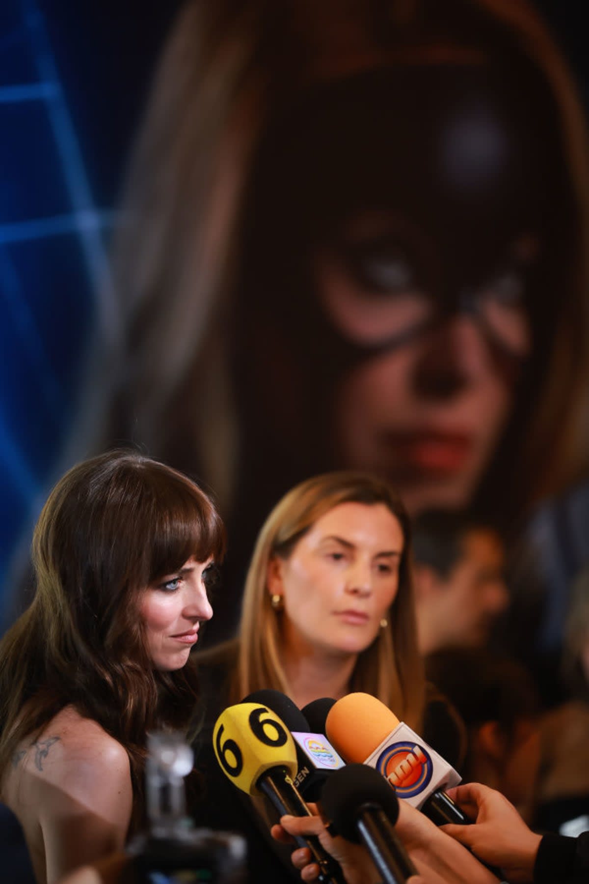 MEXICO CITY, MEXICO - FEBRUARY 13: Dakota Johnson speaks to press during the red carpet for the movie
