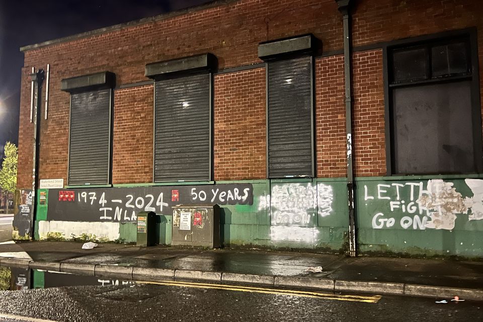 INLA graffiti appears on a wall in west Belfast (Photo by Kevin Scott)