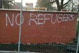 thumbnail: Police are investigating racist and sectarian graffiti that has been pictured on the walls of a construction site in Rathcoole.