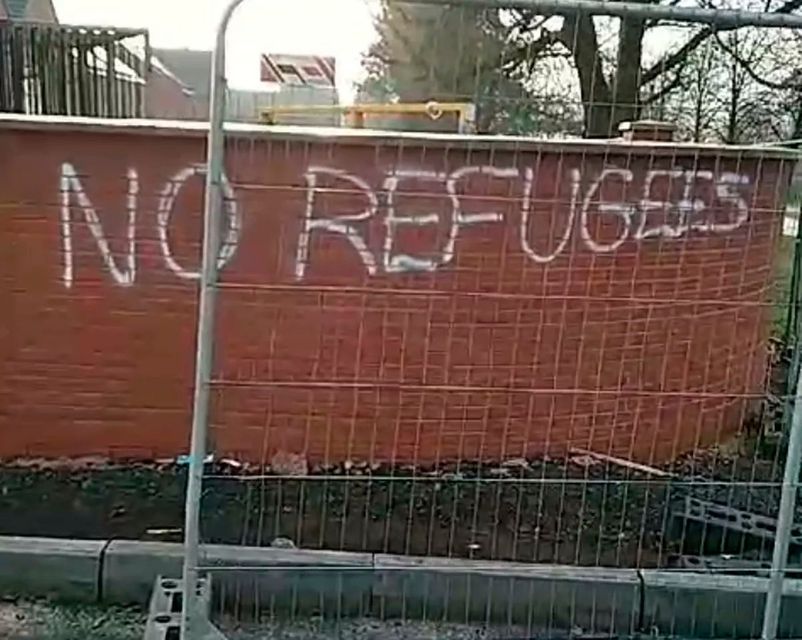 Police are investigating racist and sectarian graffiti that has been pictured on the walls of a construction site in Rathcoole.