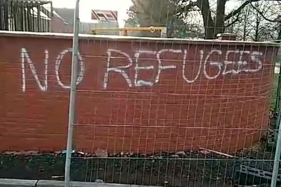 Police are investigating racist and sectarian graffiti that has been pictured on the walls of a construction site in Rathcoole.