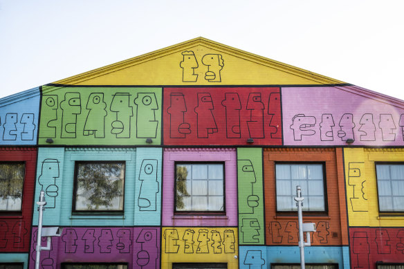 Thierry Noir’s colourful mural in Surry Hills covers all four sides of a former industrial jelly factory,