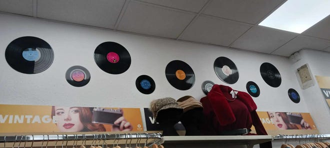 Charity shops such as this one in Dublin draw many bargain hunters.