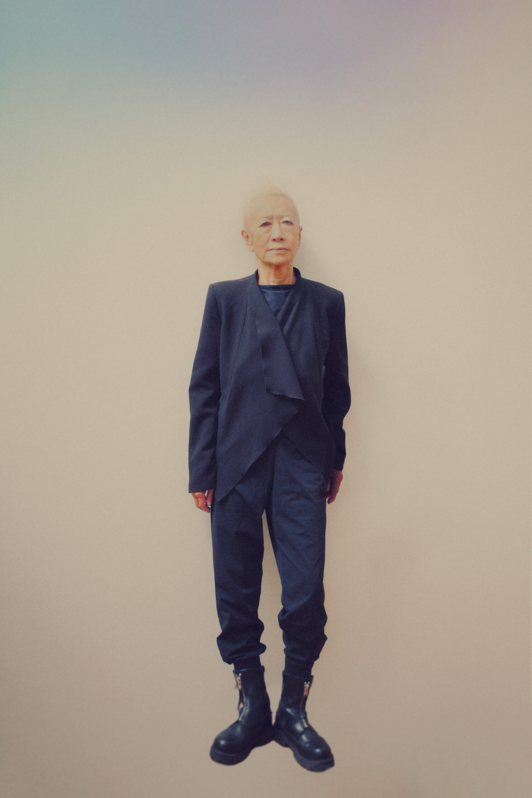 Woman wearing dark colored blazer
