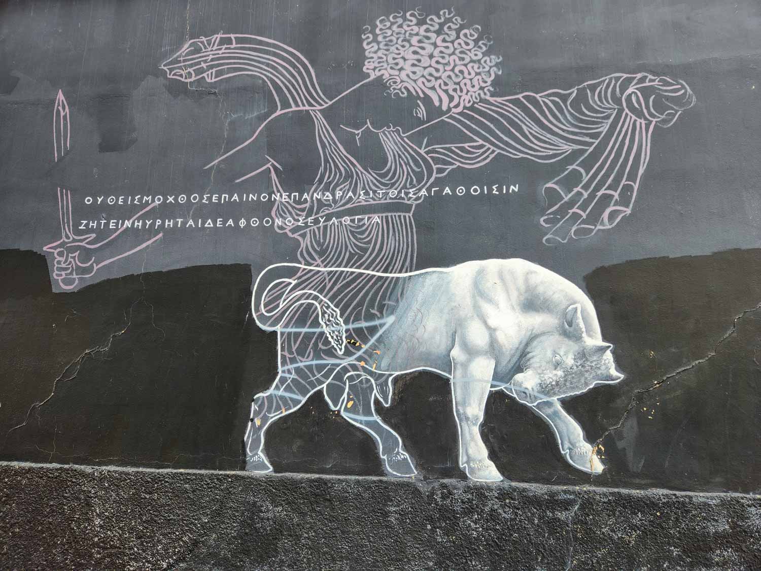 A piece of street art illustrating the myth of Greek god Zeus turning into a bull with Europa - my street art tour of Athens review