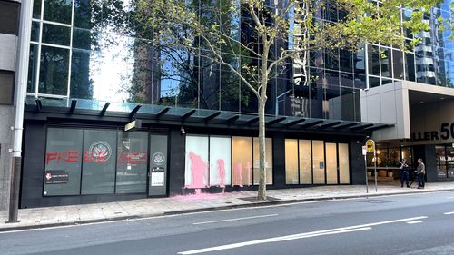 Police are investigating a graffiti attack on the US Consulate on Miller St, North Sydney.