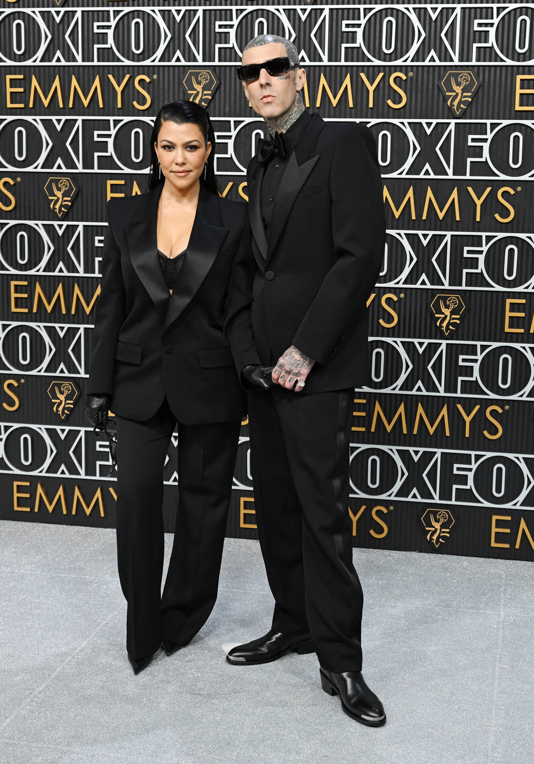 Some fans slammed Travis for not including the names of Kourtney's children with Scott in his art