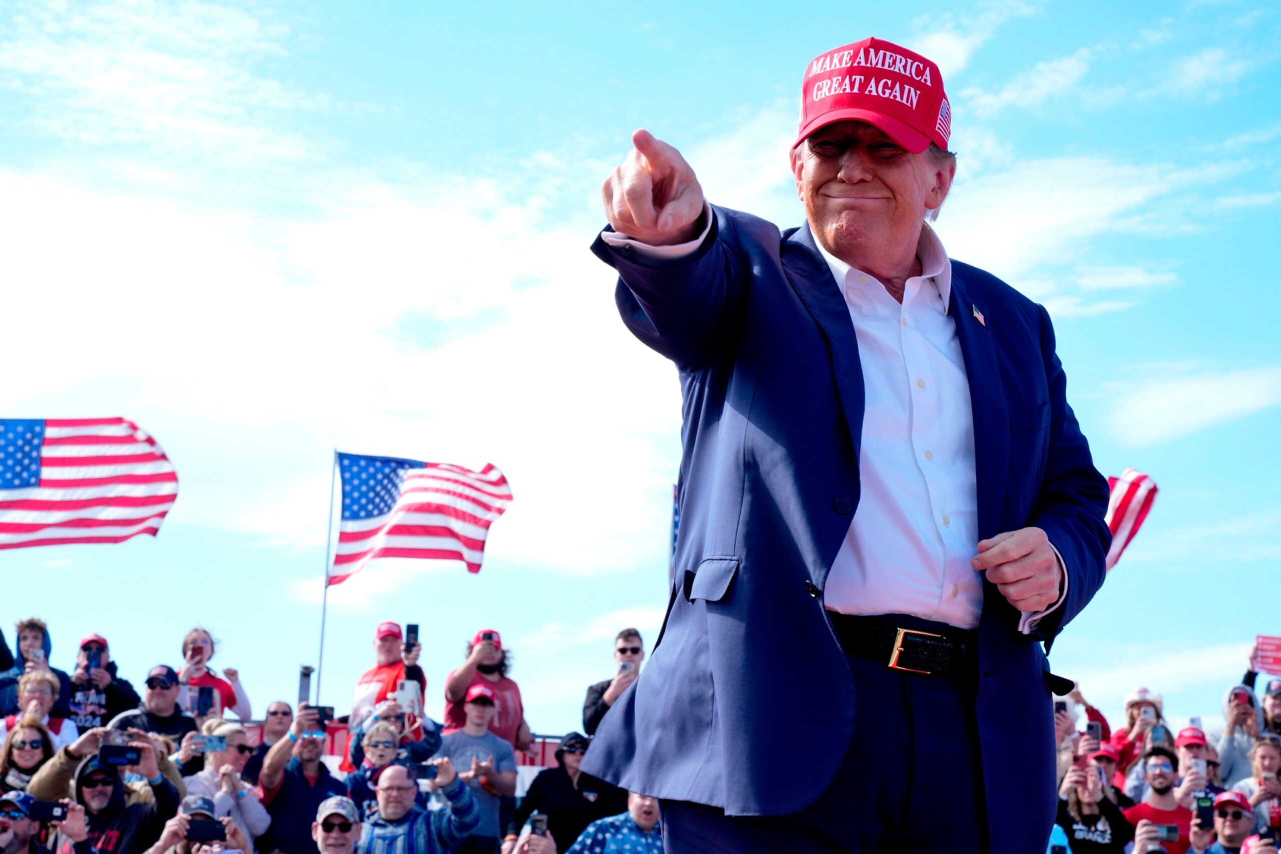 PHOTO: Republican presidential candidate former President Donald Trump gestures to the crowd at a campaign rally, on March 16, 2024, in Vandalia, Ohio.
