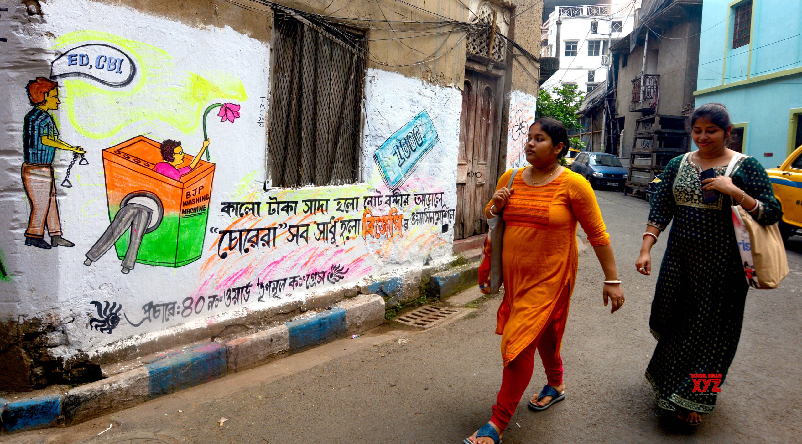 Kolkata: A wall adorned with political graffiti in anticipation of the 2024 Lok Sabha Elections #Gallery