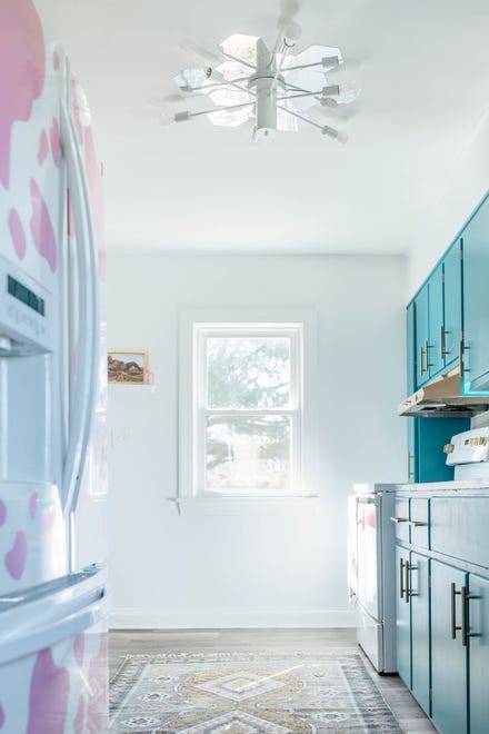 A rug in the kitchen helps tie the room’s aesthetic together at this home in Louisville's Fern Creek area.
