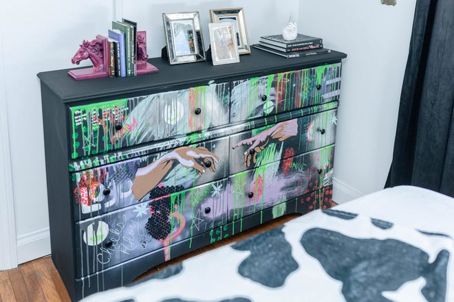 The bedroom dresser at this home in Louisville's Fern Creek area was the first piece of furniture that the homeowner ever painted.