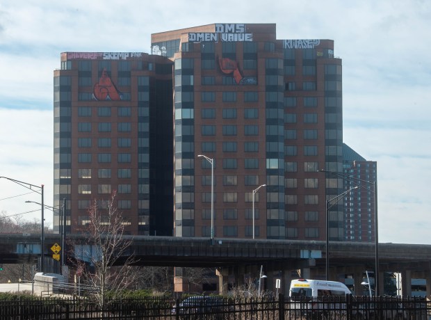 Graffiti covers the top of the former 15-story Connecticut Department of Social Service building at 25 Sigourney Street on Monday, March 18, 2024. (Aaron Flaum/Hartford Courant)