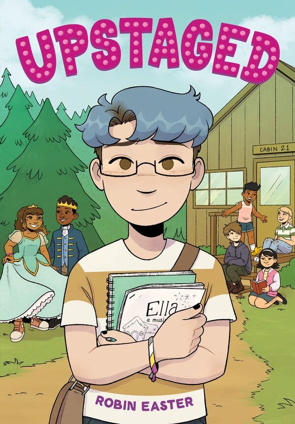 A comic book cover with the word “Upstaged” in pink with dots and a middle-schooler holding a set of papers saying “Ella.”